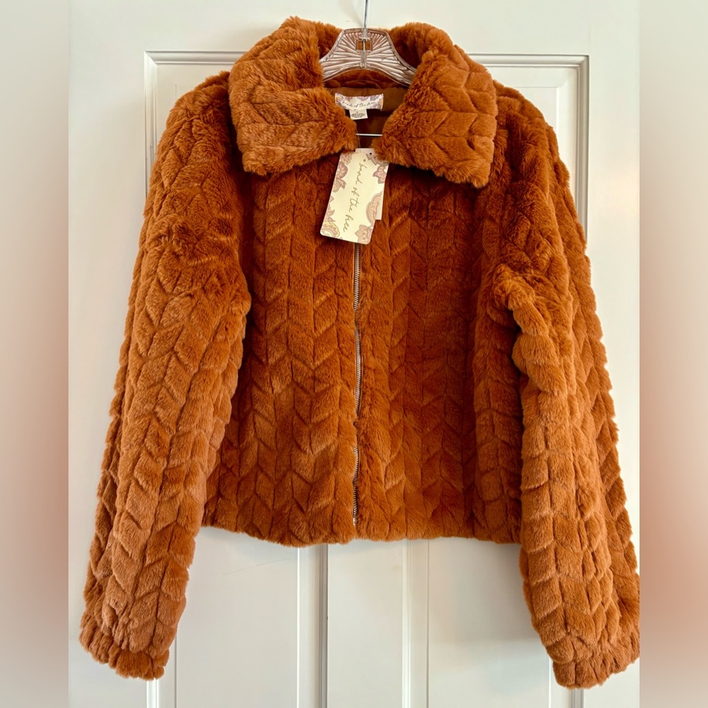Band Of The Free Val Faux Fur Jacket. Size medium. Color is a burnt orange.